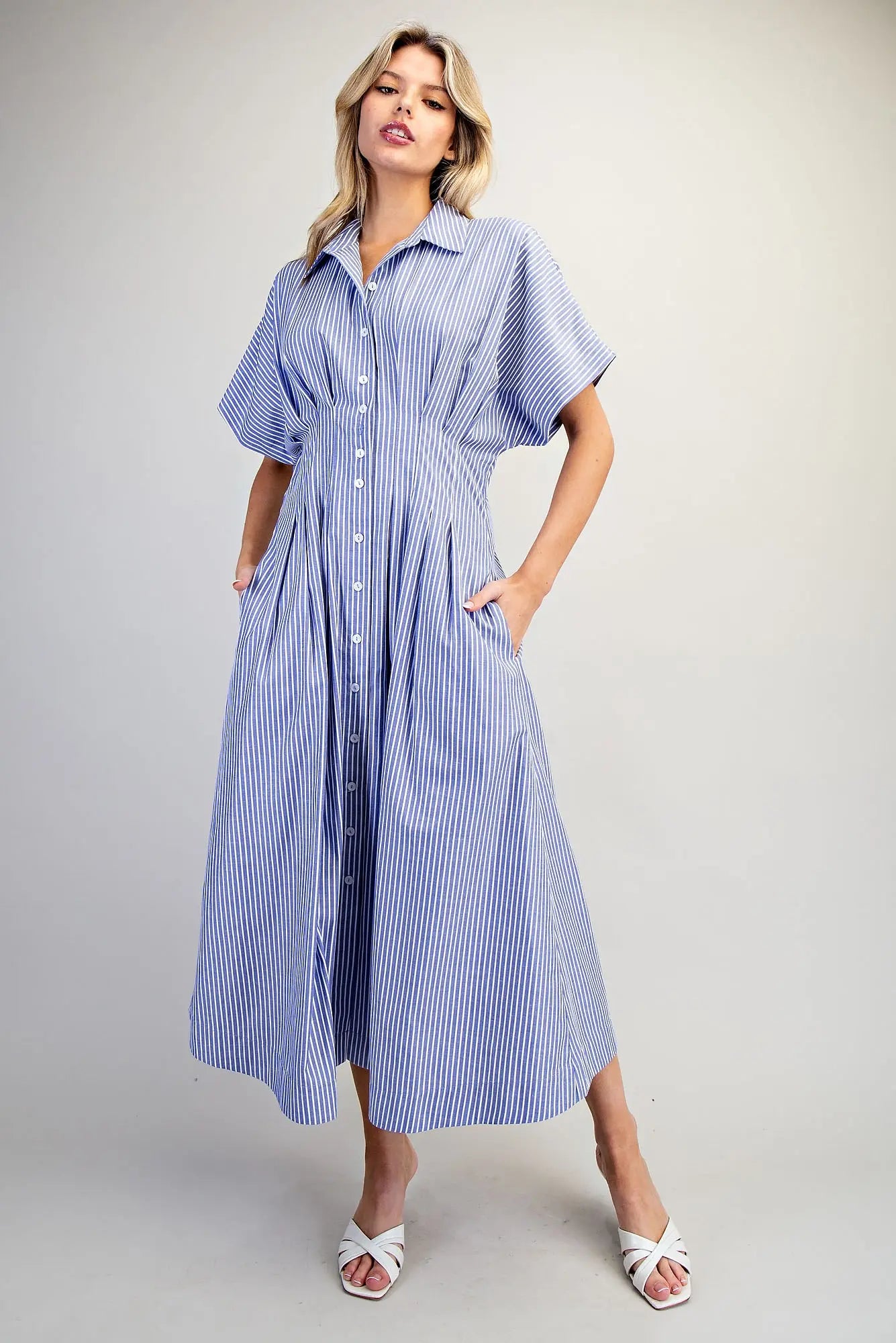 Striped maxi dress with dolman sleeves, collared neckline, and pleated waist