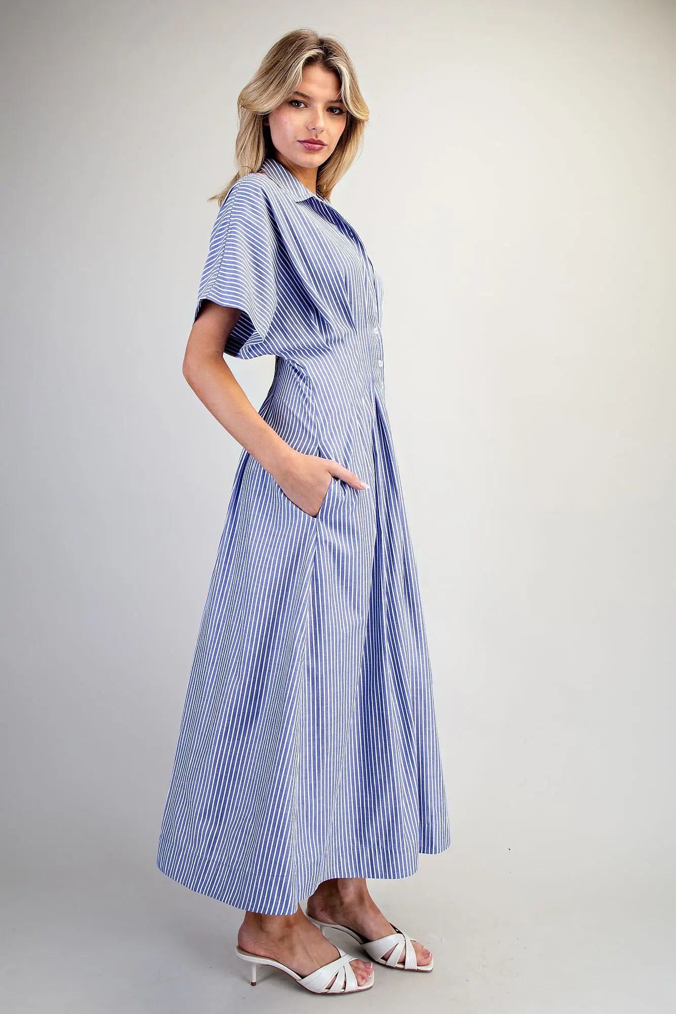 Striped maxi dress with dolman sleeves, collared neckline, and pleated waist