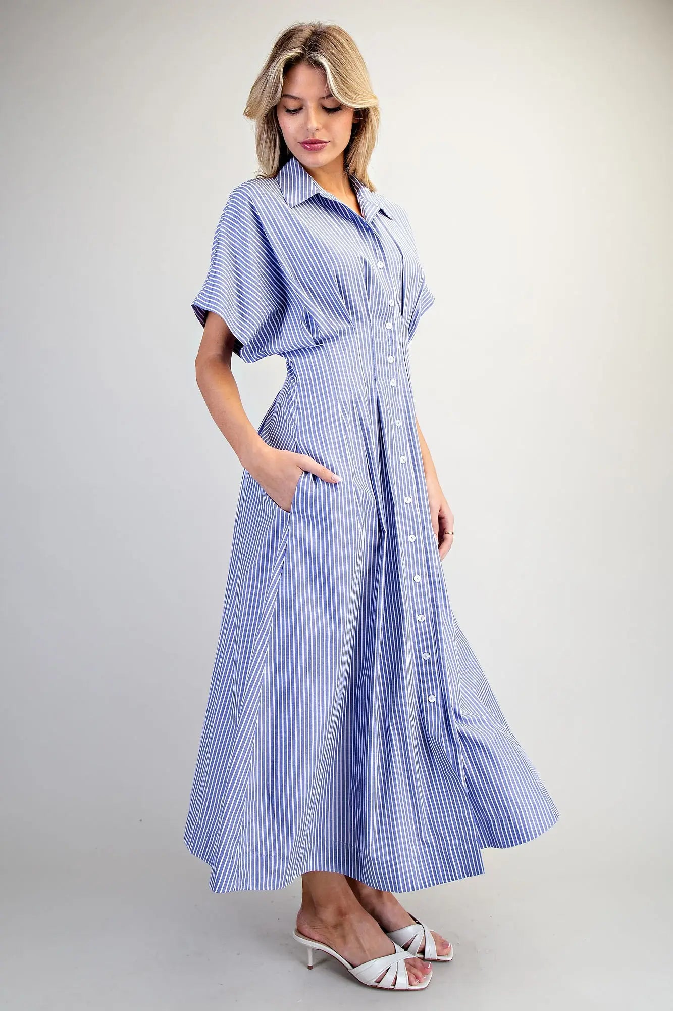 Striped maxi dress with dolman sleeves, collared neckline, and pleated waist
