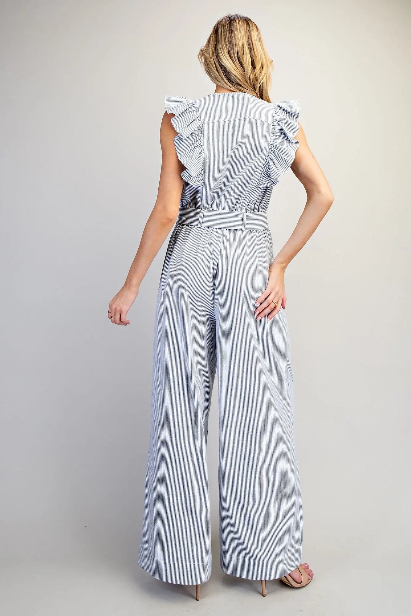 Striped ruffle shoulder jumpsuit with tie waist and wide leg