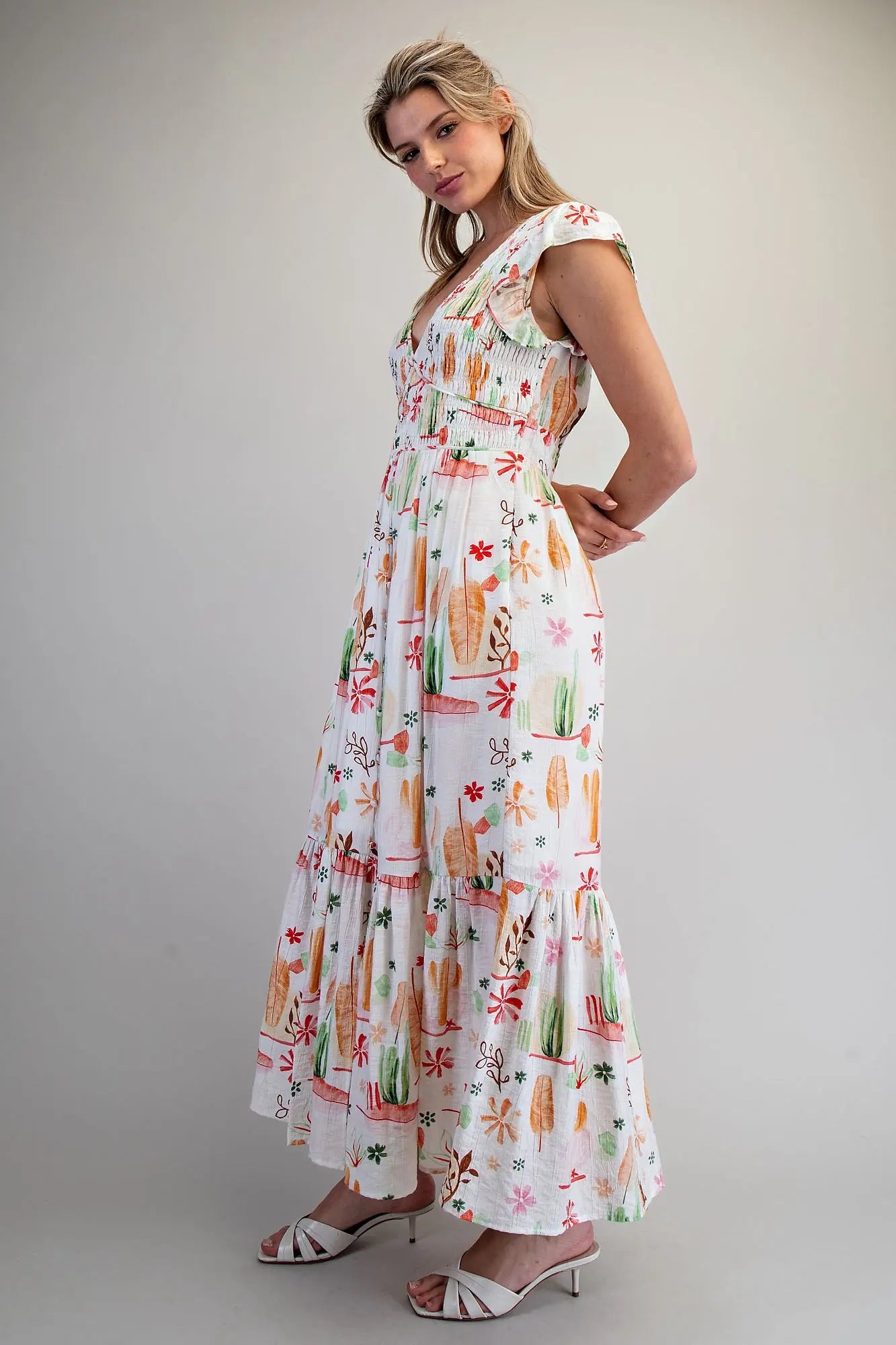 Desert inspired printed maxi dress with smocked bodice and ruffled flutter sleeves