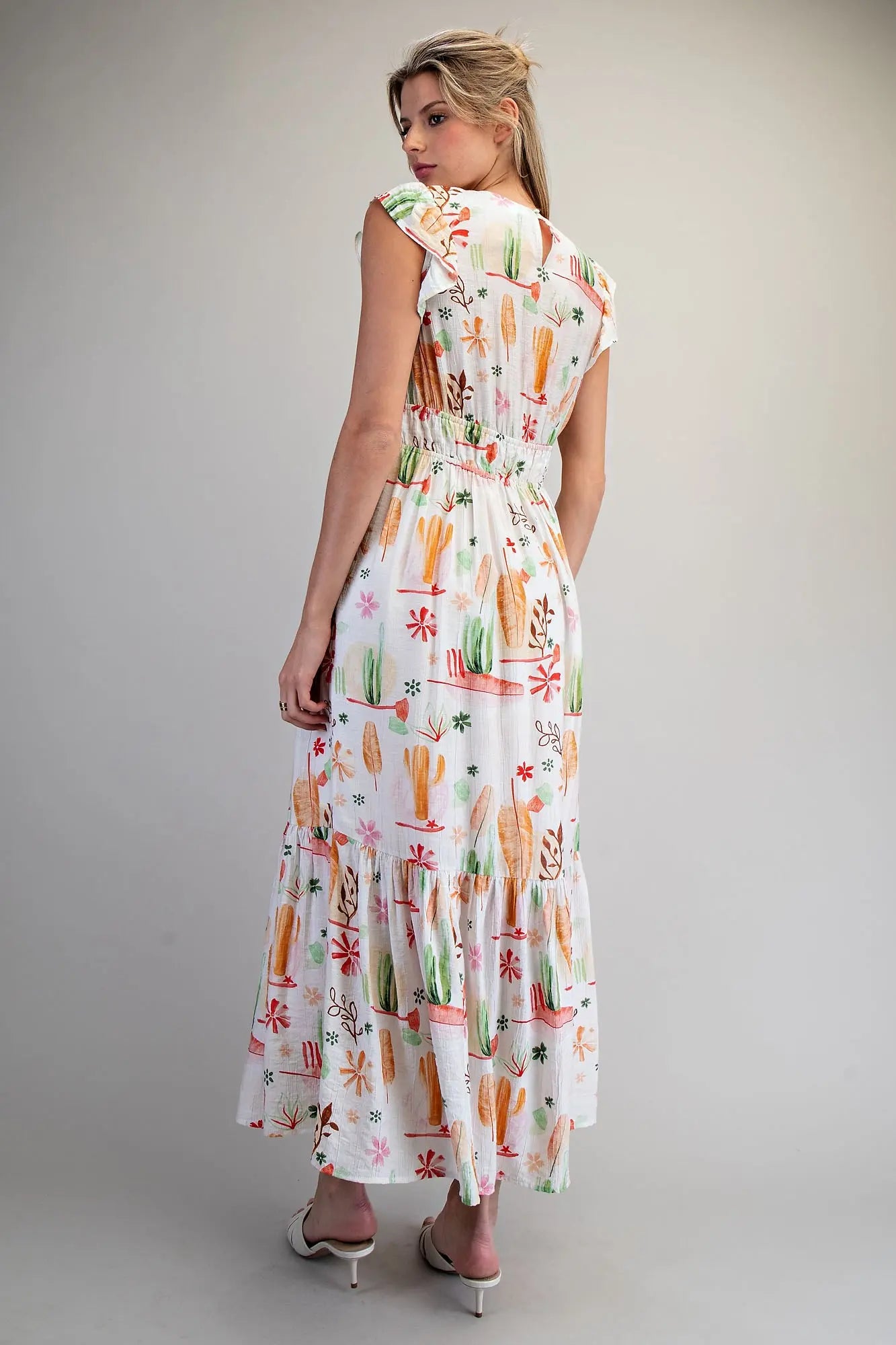 Desert inspired printed maxi dress with smocked bodice and ruffled flutter sleeves