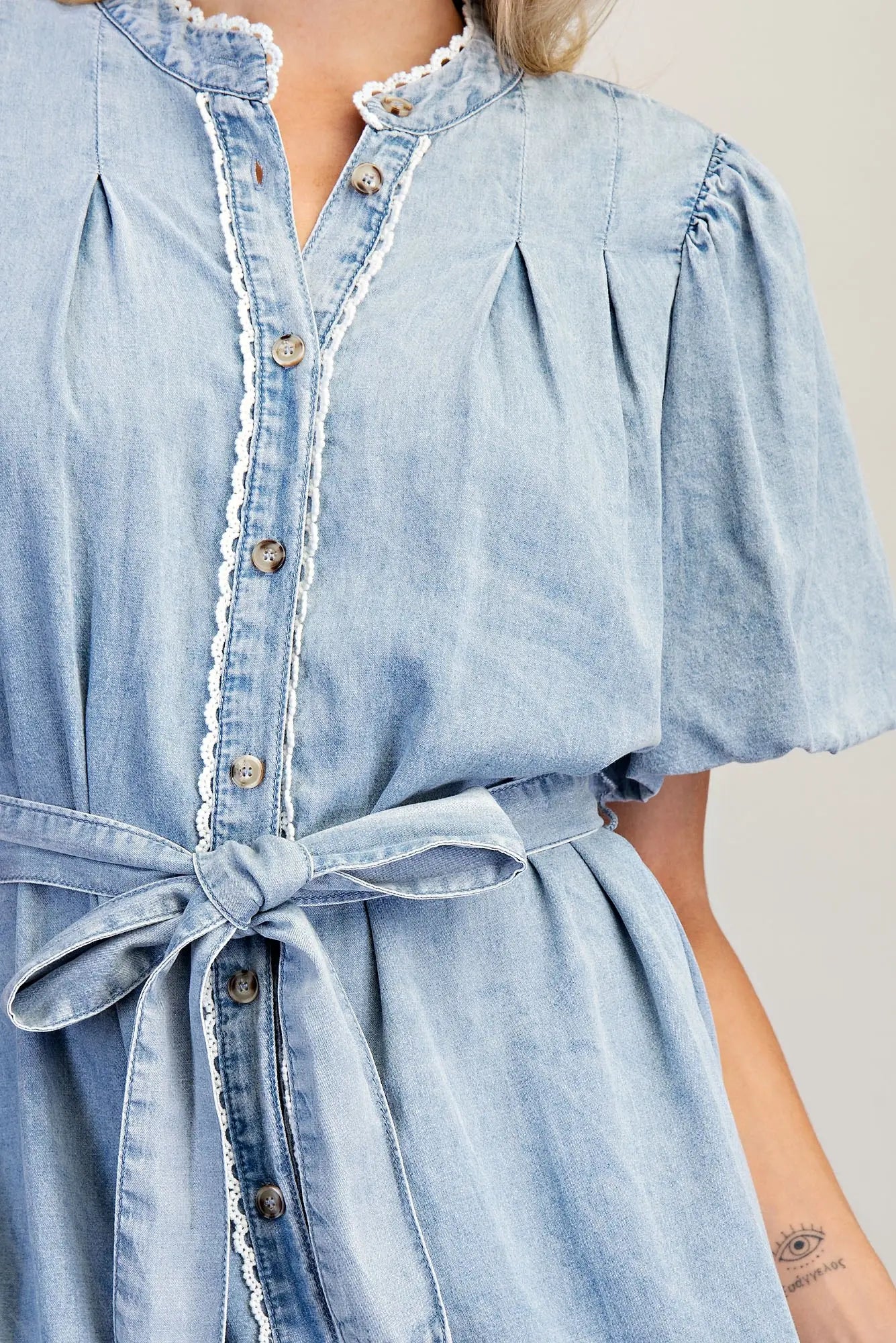 Vintage inspired denim dress with button front and tiered skirt