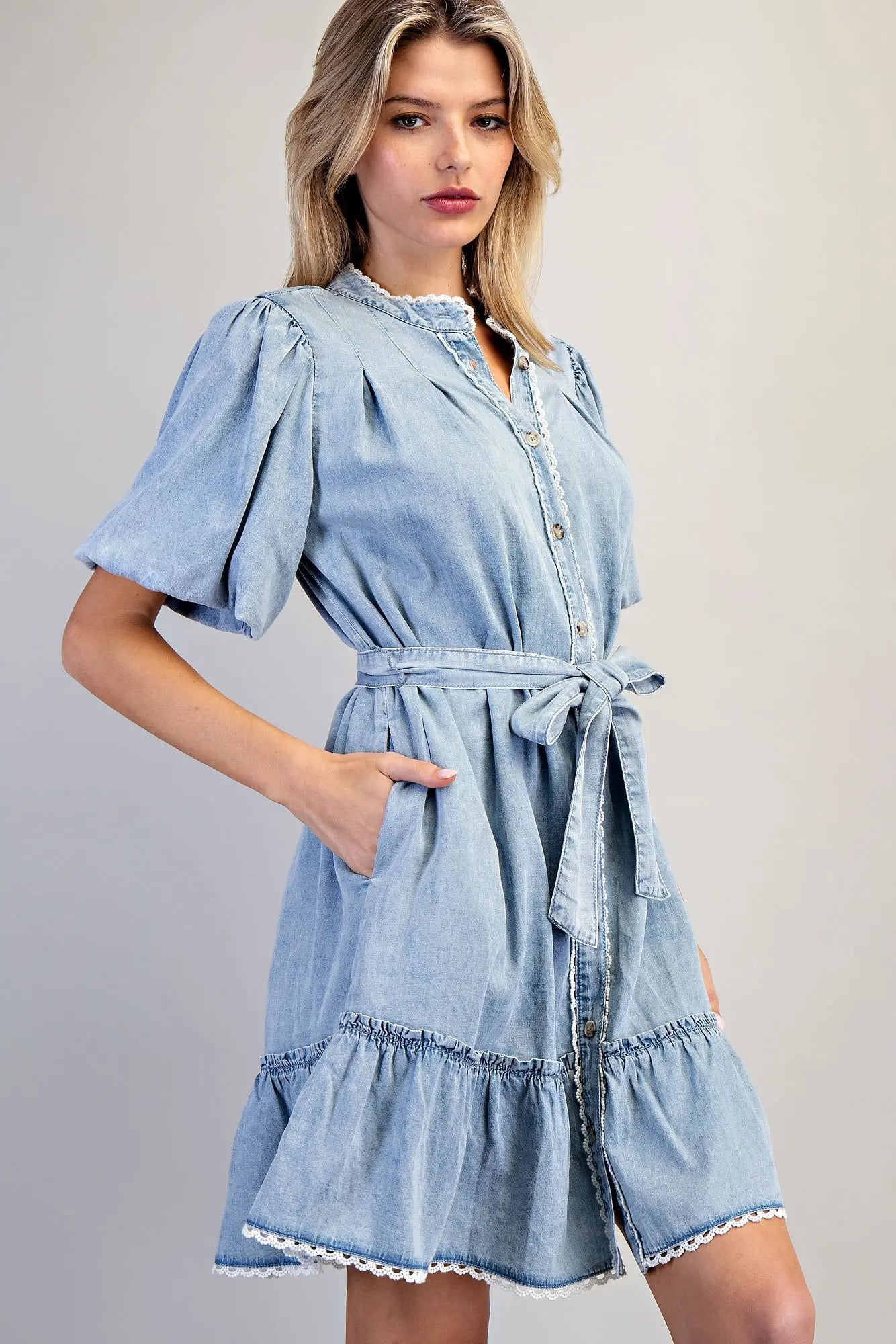 Vintage inspired denim dress with button front and tiered skirt