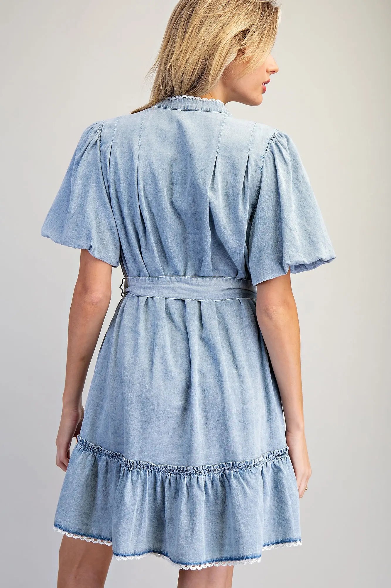 Vintage inspired denim dress with button front and tiered skirt