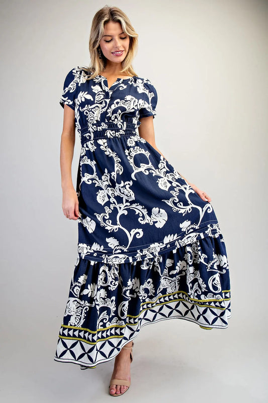 Printed maxi dress with puff sleeves and geometric border hem