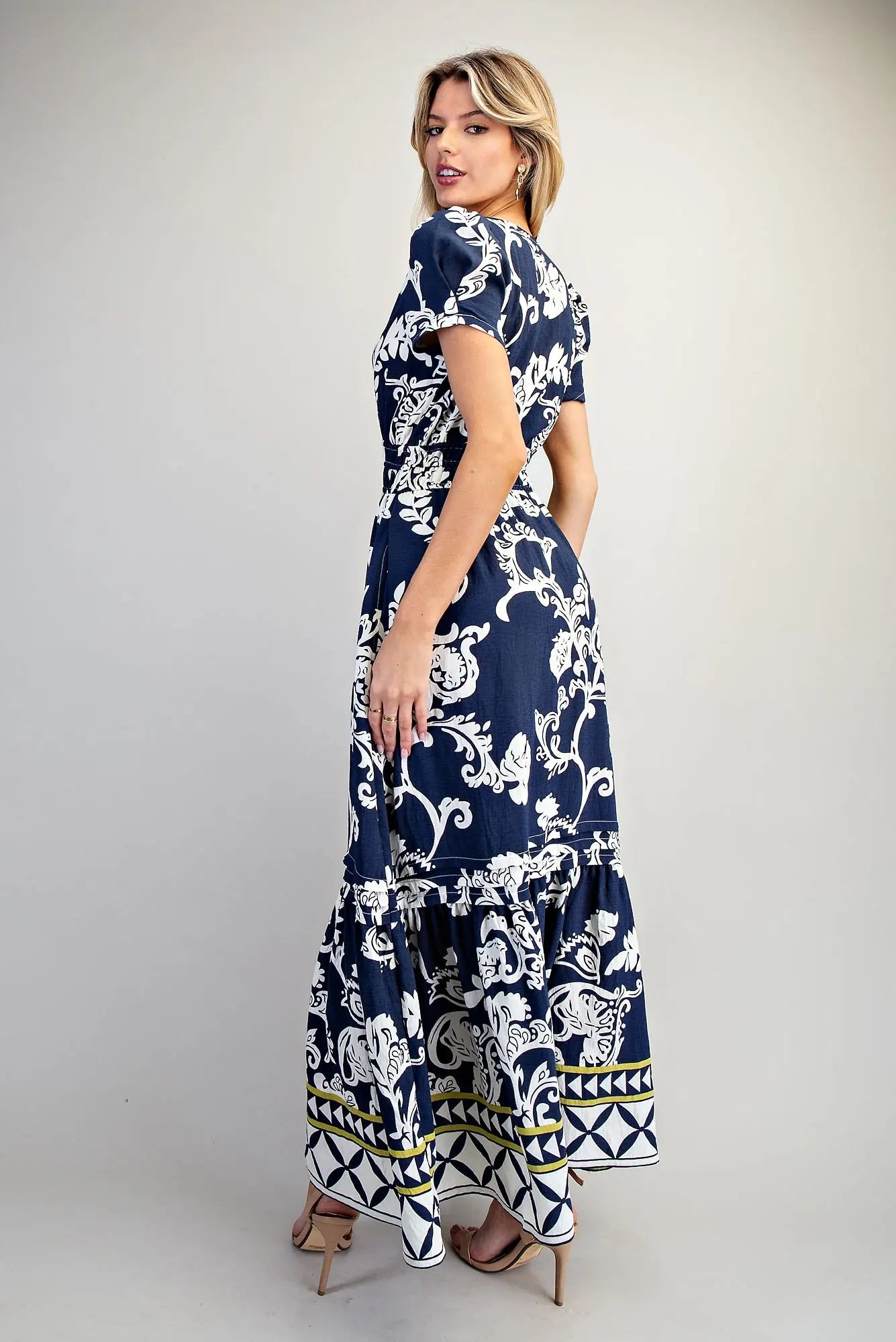 Printed maxi dress with puff sleeves and geometric border hem