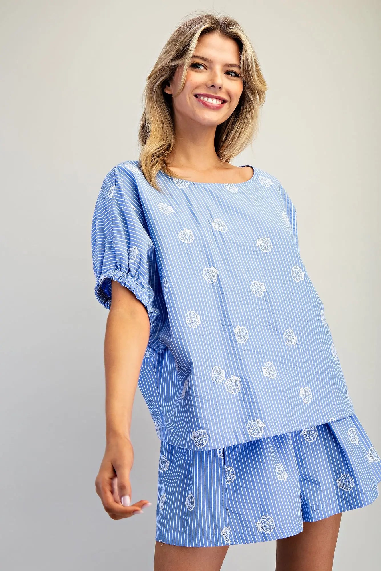 Seashell pinstriped top with boat neckline and dolman sleeves