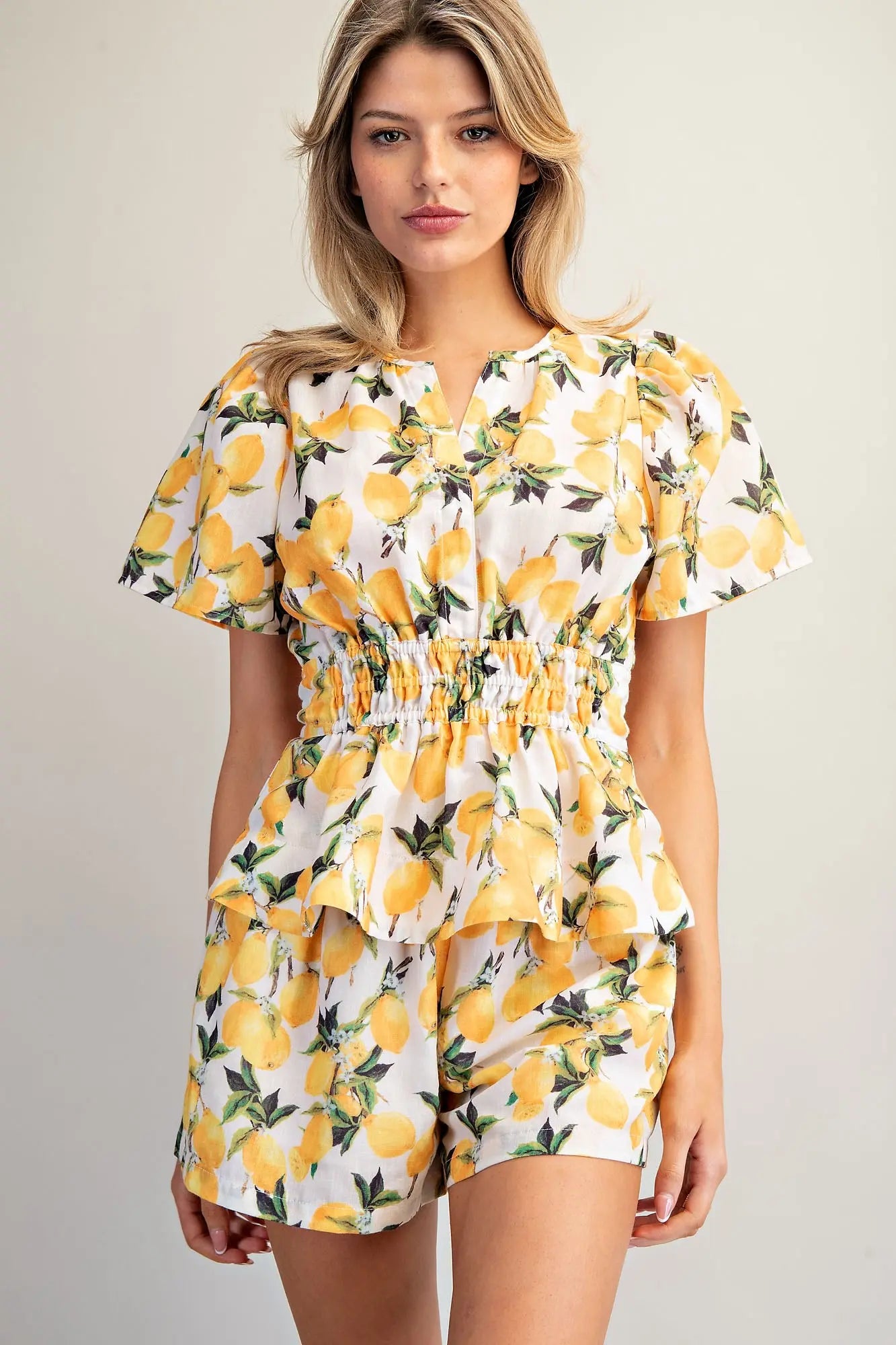  Lemon Peplum Top 