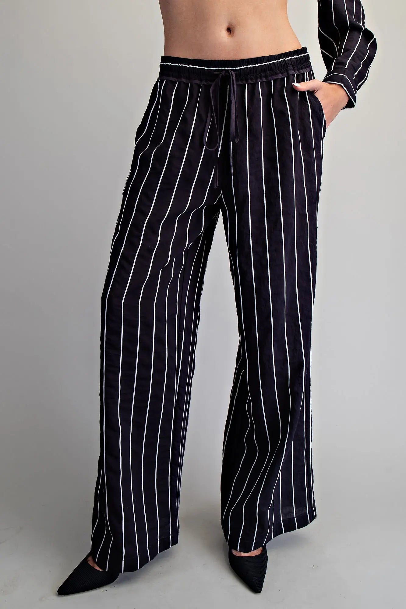 Women’s relaxed fit pinstripe pants with pockets