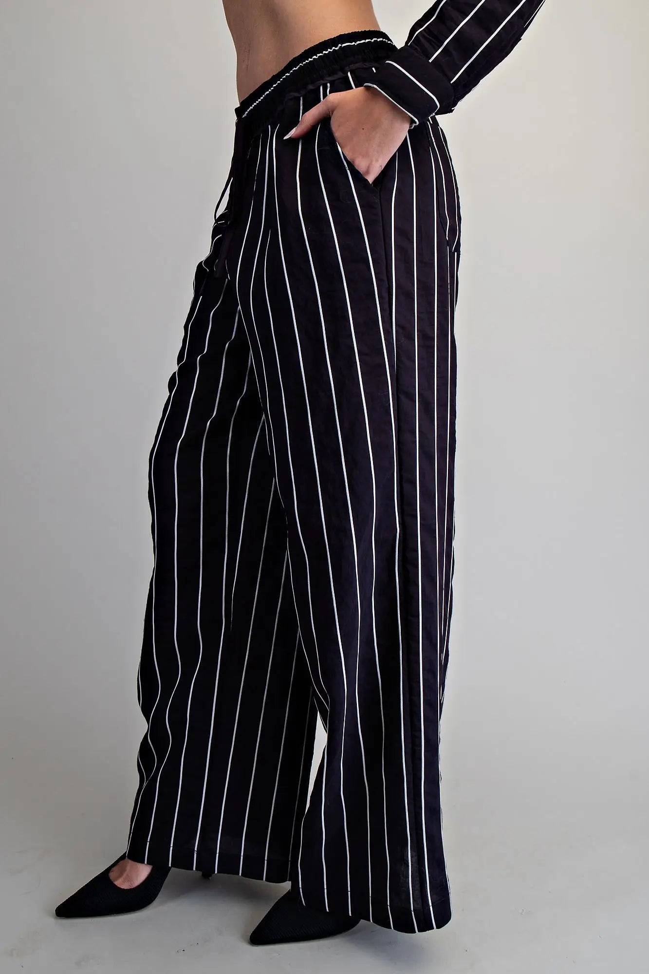 Women’s relaxed fit pinstripe pants with pockets