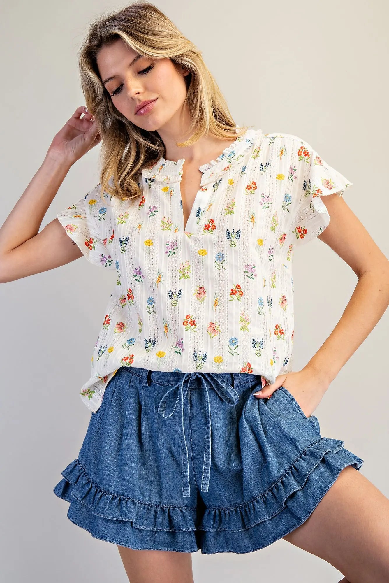 Women’s cotton floral top with flutter sleeves