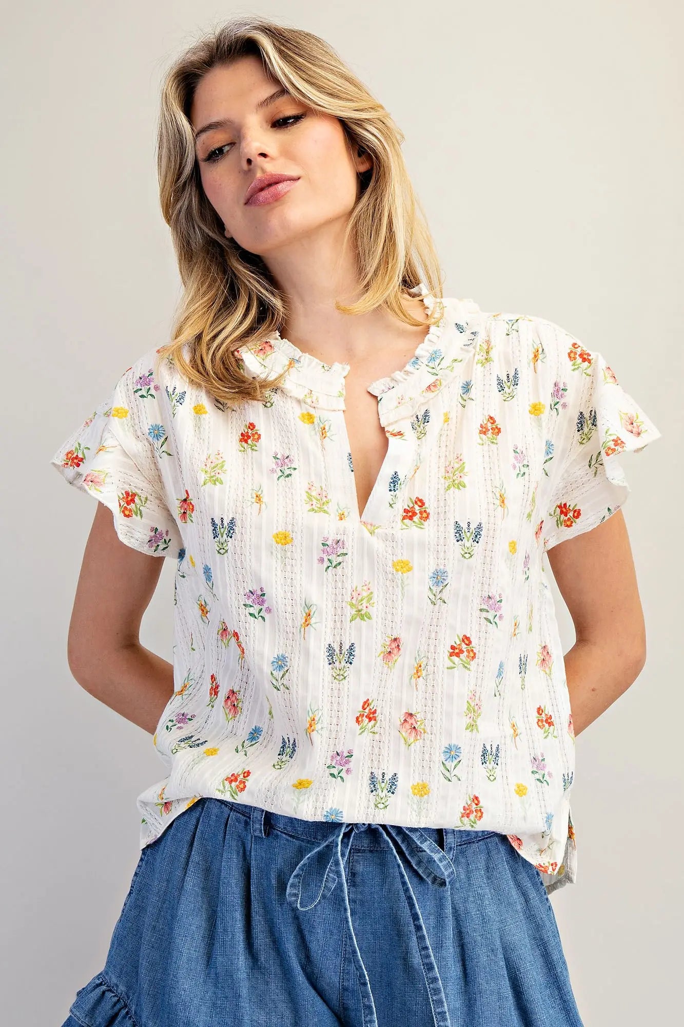 Women’s cotton floral top with flutter sleeves