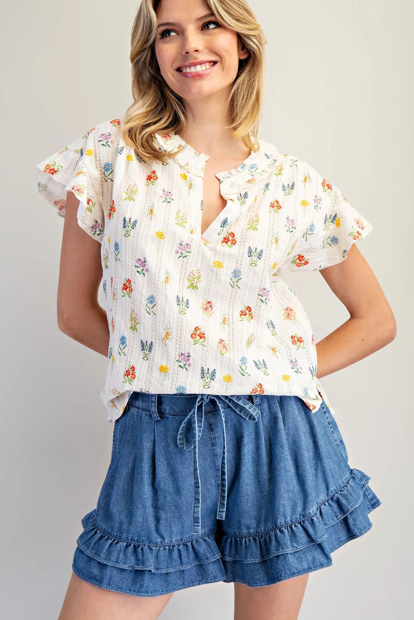 Women’s cotton floral top with flutter sleeves