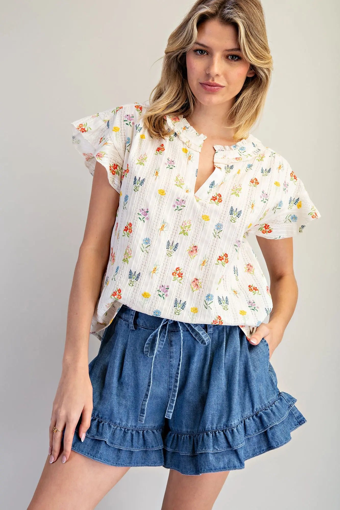 Women’s cotton floral top with flutter sleeves