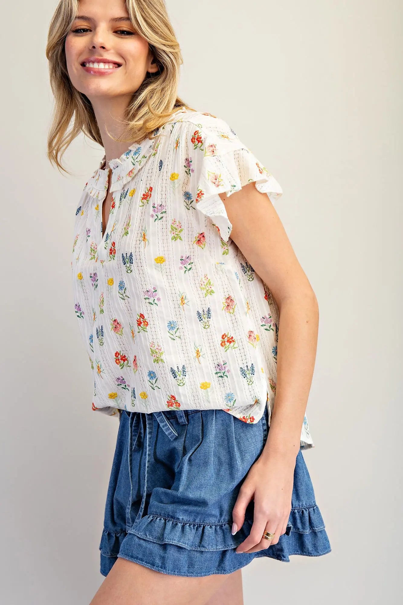 Women’s cotton floral top with flutter sleeves