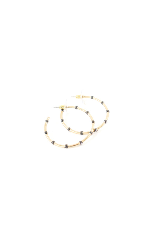 Gold hoop earrings with dark bead detailing and post-back closure