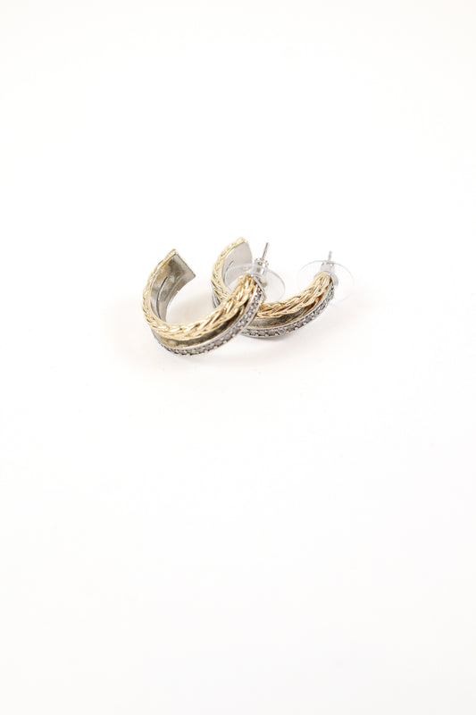 Mixed metal braided hoop earrings with gold texture and crystal detailing