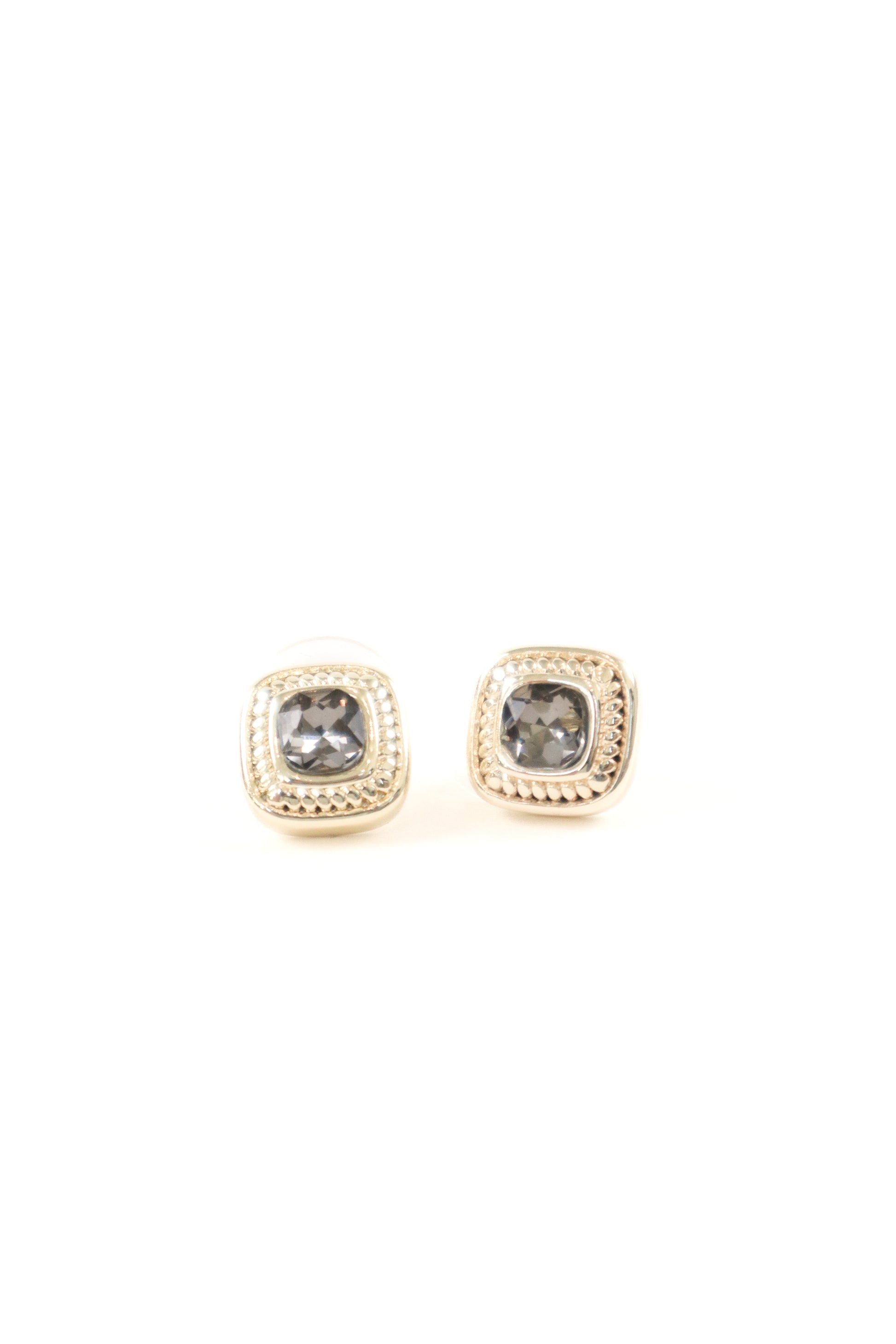 Gold framed cushion-cut stud earrings with black center stone
