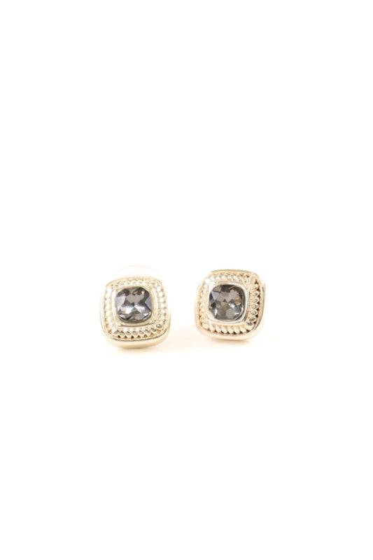 Gold framed cushion-cut stud earrings with black center stone