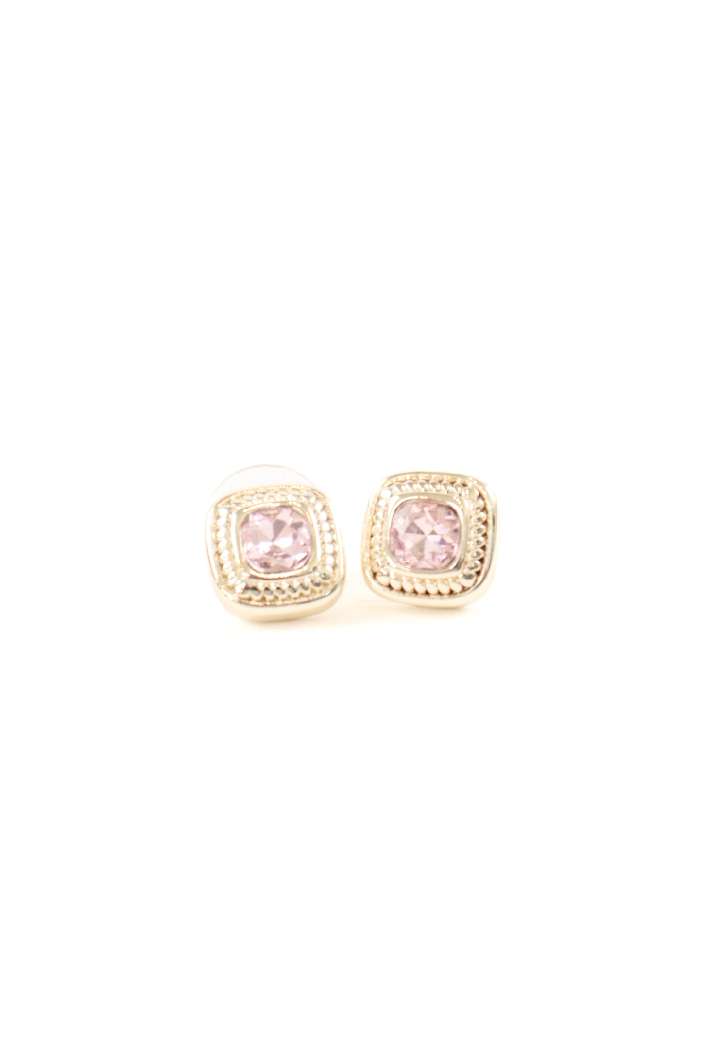 Gold framed cushion-cut stud earrings with blush pink center stone