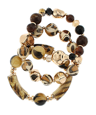 The Leocadia Mixed Bead Bracelet Set adds bold texture and earthy glamour to any look.