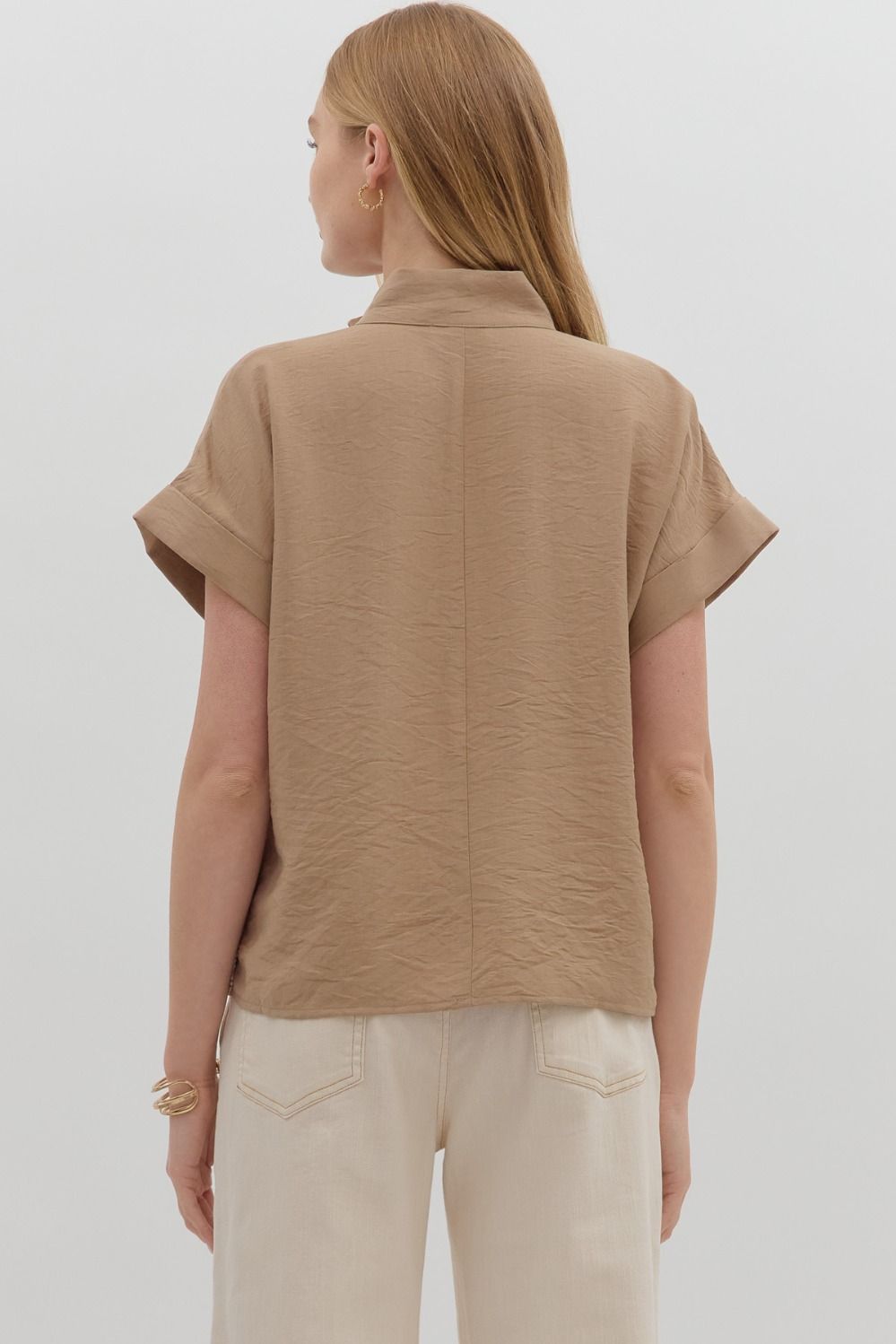 A breezy short sleeve pullover top with multicolor crochet trim and roll-up banded sleeves.
