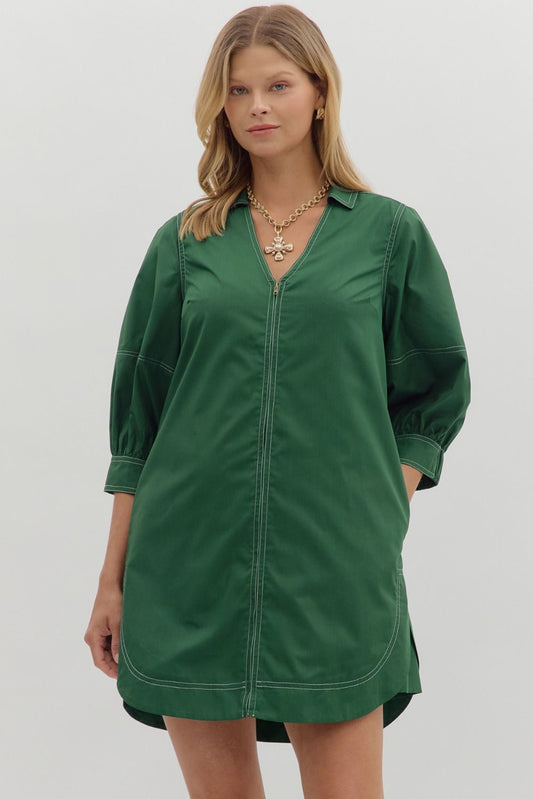 A charming lantern sleeve mini dress with contrast stitching and pockets—your go-to for effortless summer style.