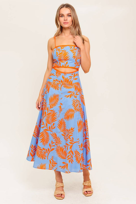 A cotton printed midi dress with a flattering waist cut-out and a flowing circle skirt.

