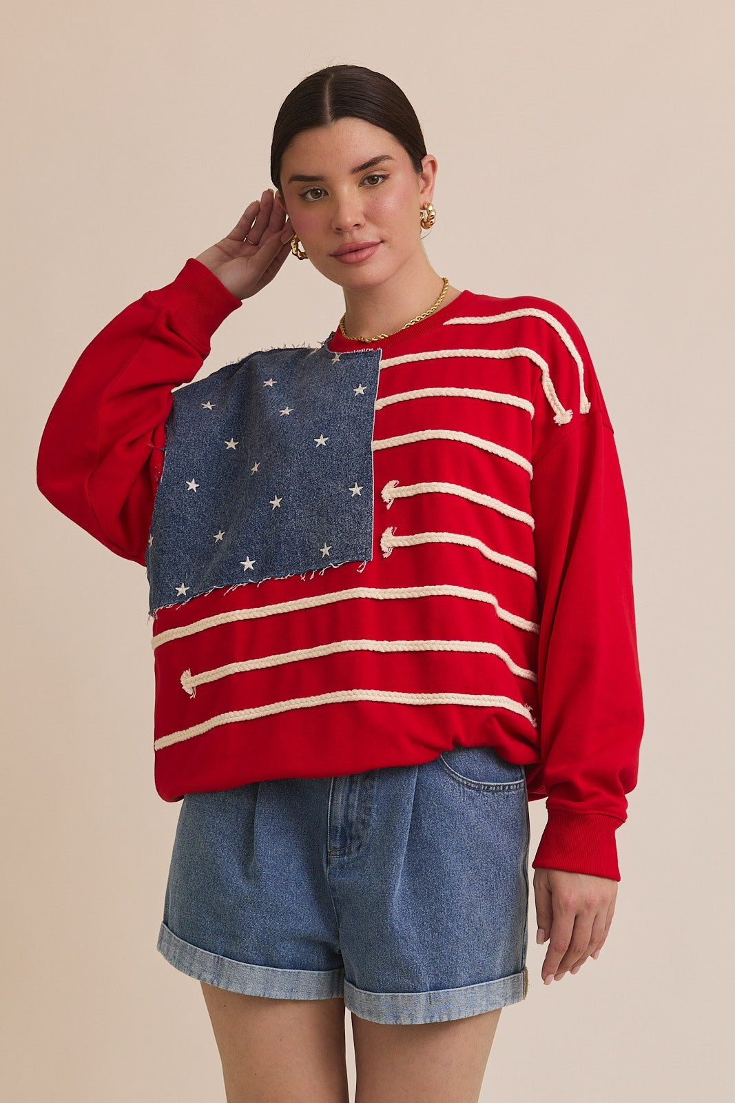 A cozy, statement-making crew neck sweatshirt featuring a bold USA flag graphic—your go-to for patriotic flair with everyday comfort.