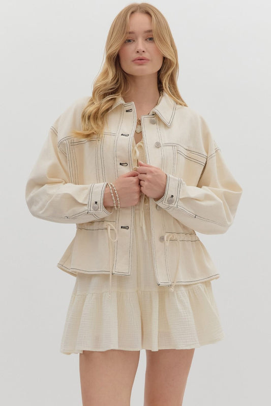 A lightweight woven utility jacket with a cinchable drawstring waist for easy, flattering layering.