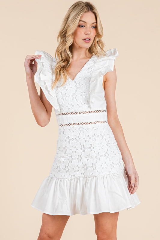 A romantic lace mini dress with ruffle sleeves and delicate waist detailing.
