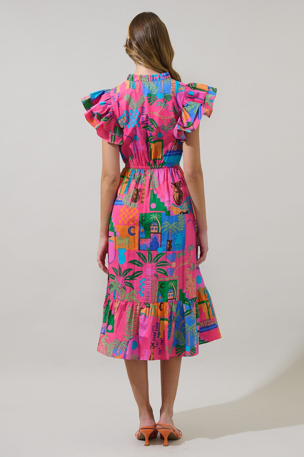A stylish, ruffled midi dress with a flattering V-neckline and adjustable tie waist—perfect for dressing up or down.