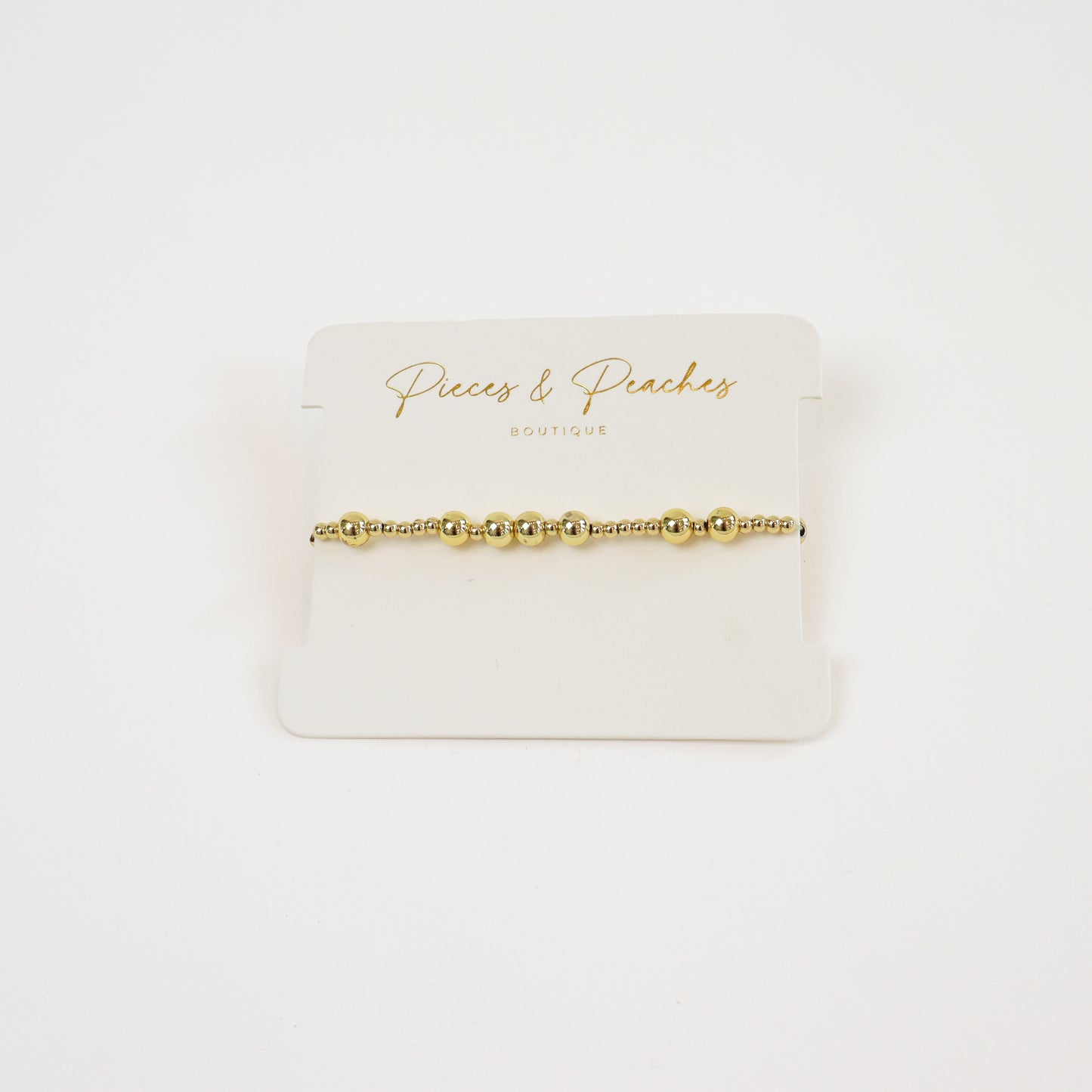 Elegant gold beaded bracelet with a minimalist design for everyday wear