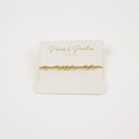 Elegant gold beaded bracelet with a minimalist design for everyday wear
