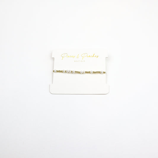 14k gold-filled beaded bracelet with grouped freshwater pearls, designed for timeless elegance