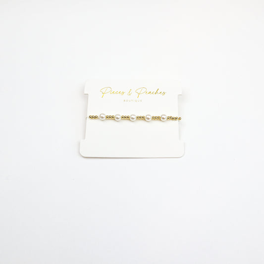 14k gold-filled beaded bracelet with genuine freshwater pearls, perfect for everyday elegance"