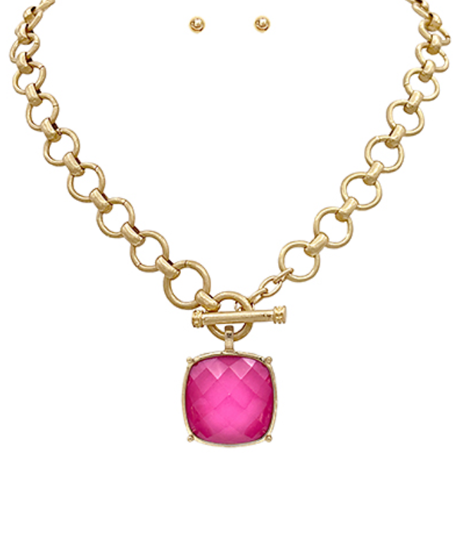  toggle necklace with a cushion-cut gemstone pendant, available in multiple colors.