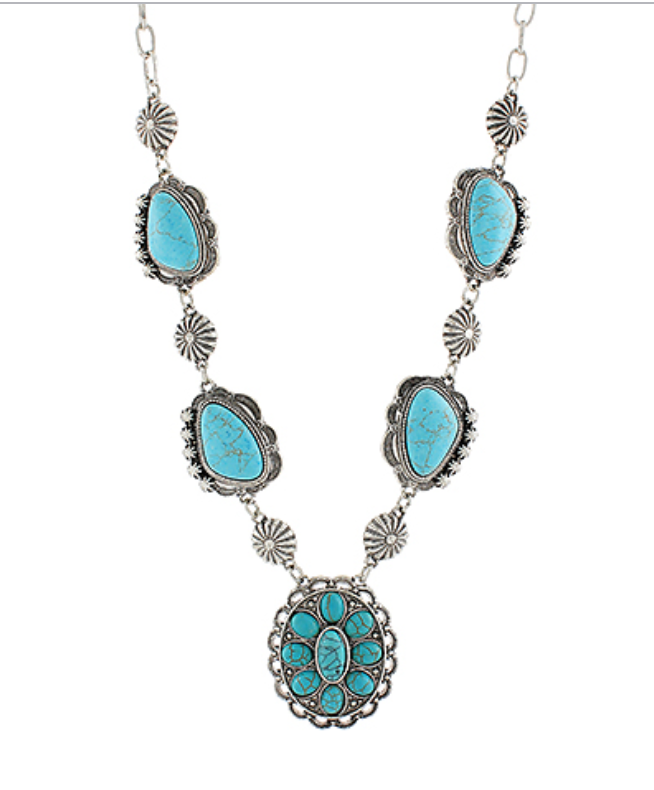 Bohemian Turquoise Statement Necklace with silver detailing and natural turquoise stones, designed for a chic and elegant look.