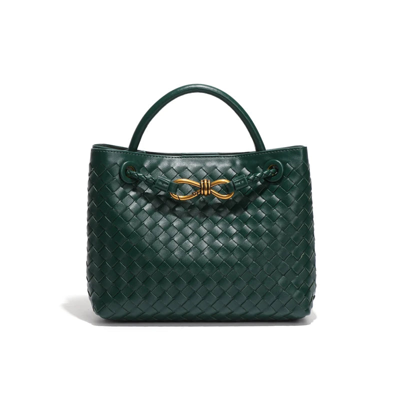 Elegant woven leather tote bag with gold-tone bow hardware and structured handles