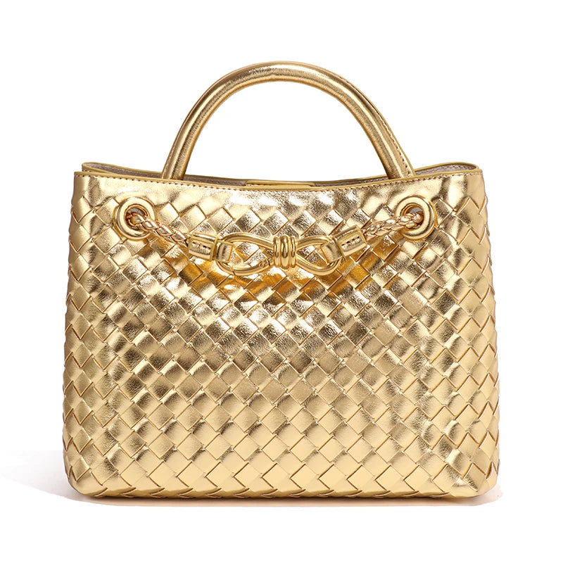Elegant woven leather tote bag with gold-tone bow hardware and structured handles