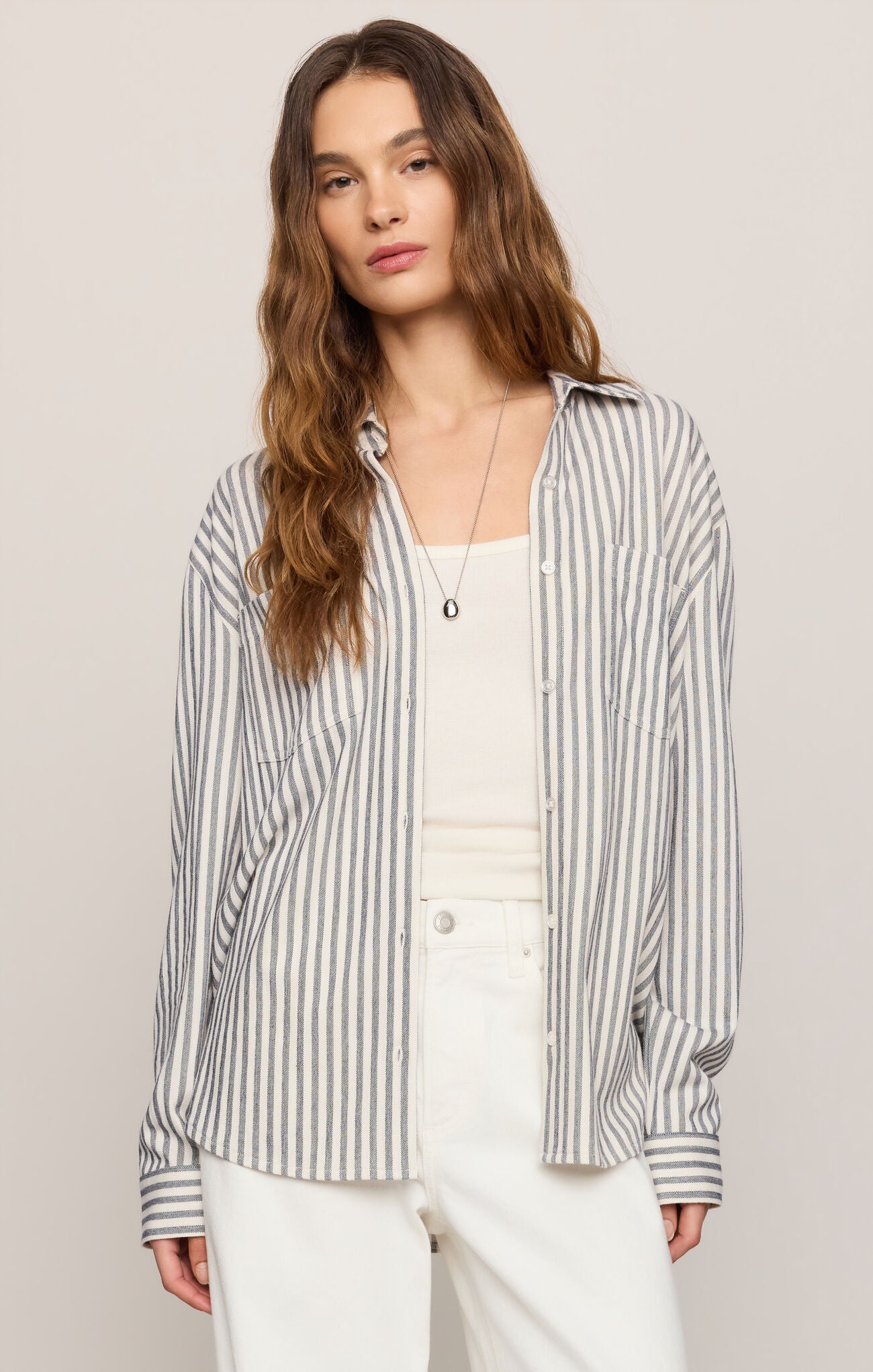 front of collared button-front shirt crafted from silky stretch knit for effortless comfort and elevated everyday style.
