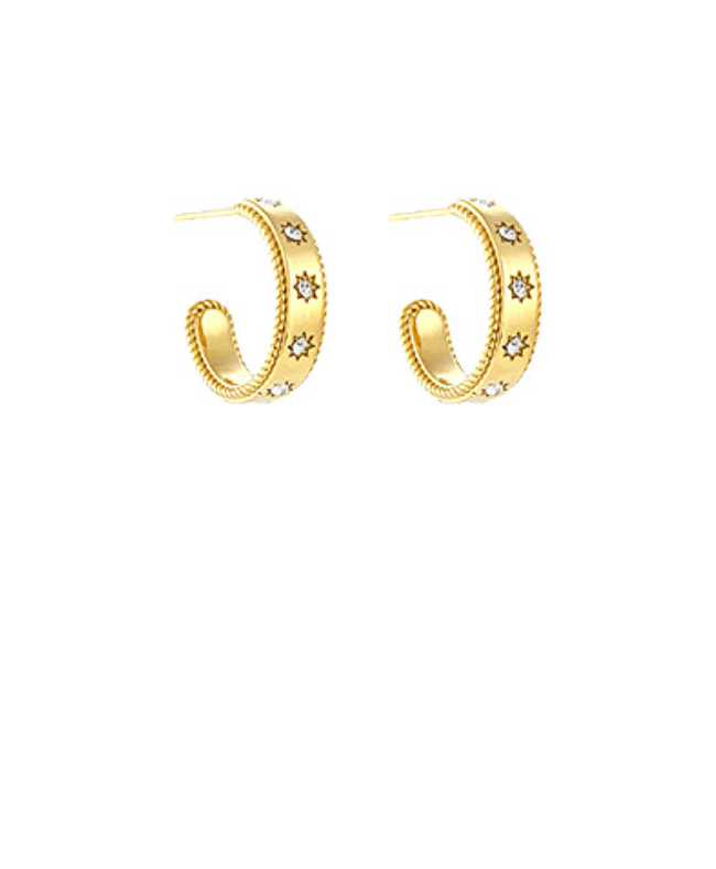 Gold mini hoop earrings with starburst cubic zirconia accents, celestial-inspired women’s jewelry
