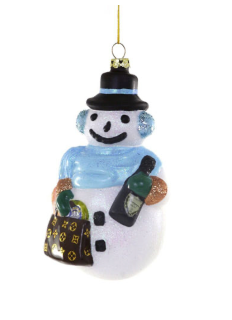 Chic Snowman Ornament featuring a stylish snowman with a top hat, blue scarf, Louis Vuitton-inspired handbag, and a bottle of bubbly, adorned with glitter accents.