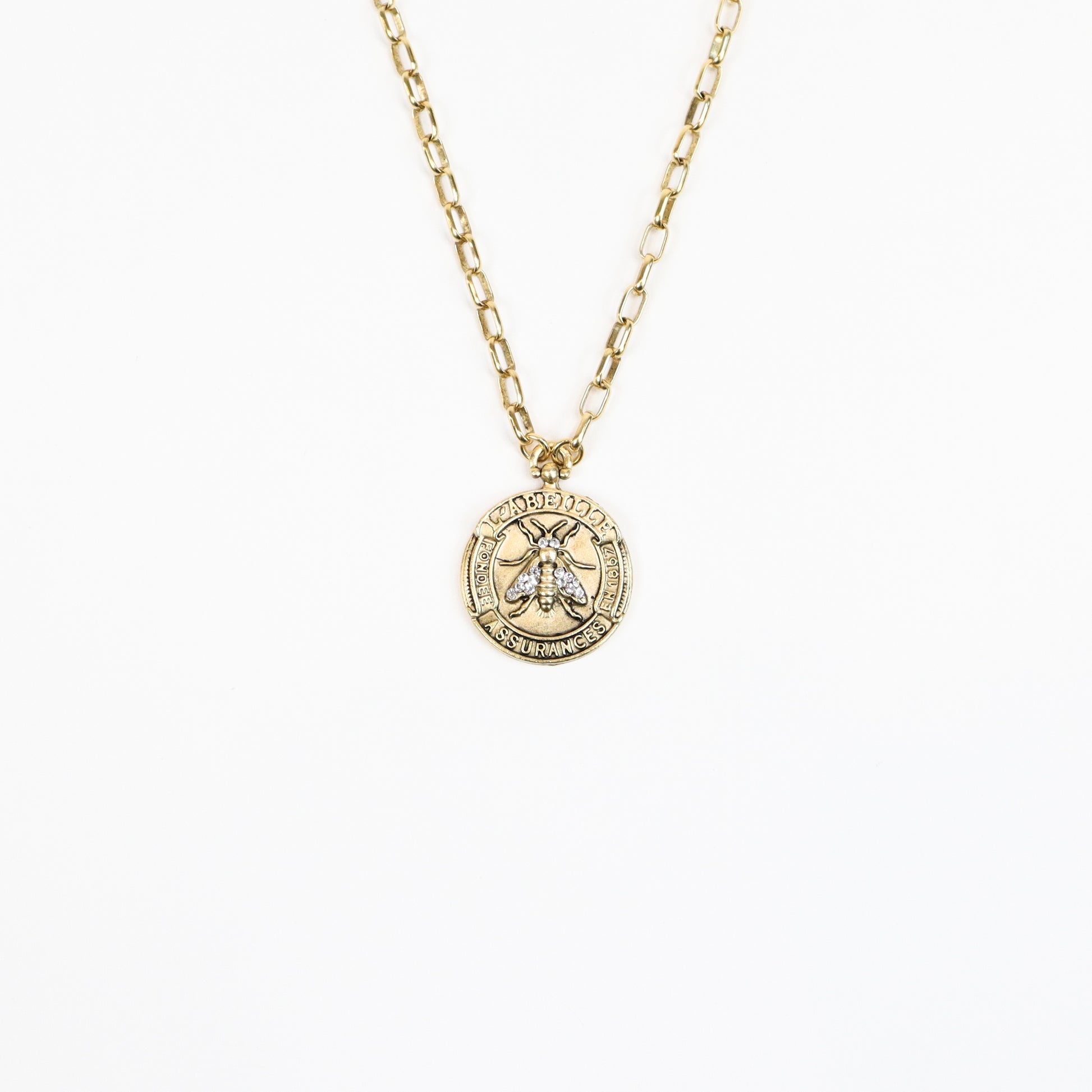 handcrafted 22K gold-plated bee medallion necklace featuring a detailed honeybee engraving with sparkling crystal accents, suspended from a chic gold link chain for a luxurious, nature-inspired look.