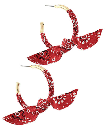 The Vespera Fabric Bow Hoop Earrings add playful charm with soft bows and classic hoops.