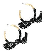 The Vespera Fabric Bow Hoop Earrings add playful charm with soft bows and classic hoops.