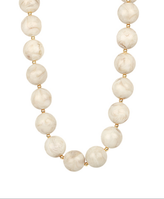 Elegant marble bead necklace with gold accents, featuring a luxurious, timeless design.