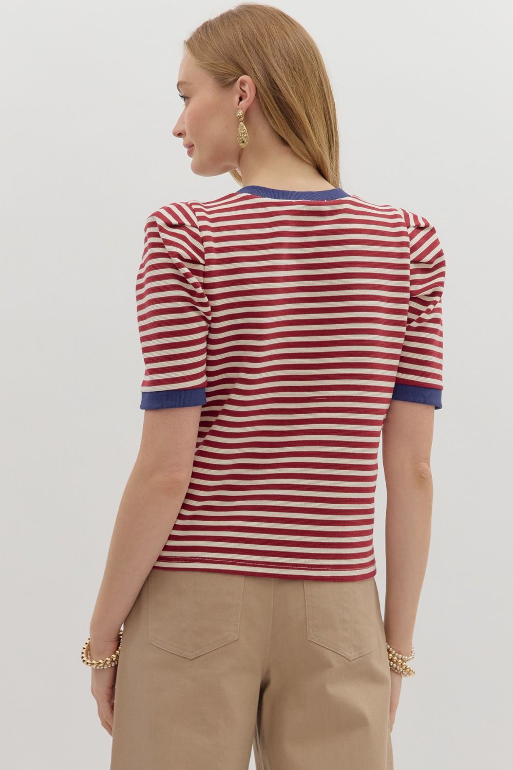 Elevate your casual wardrobe with the Tawny Striped Accent Knit Top—perfect for summer layering, everyday wear, and on-trend minimal style. Lightweight and breathable for transitional seasons.
