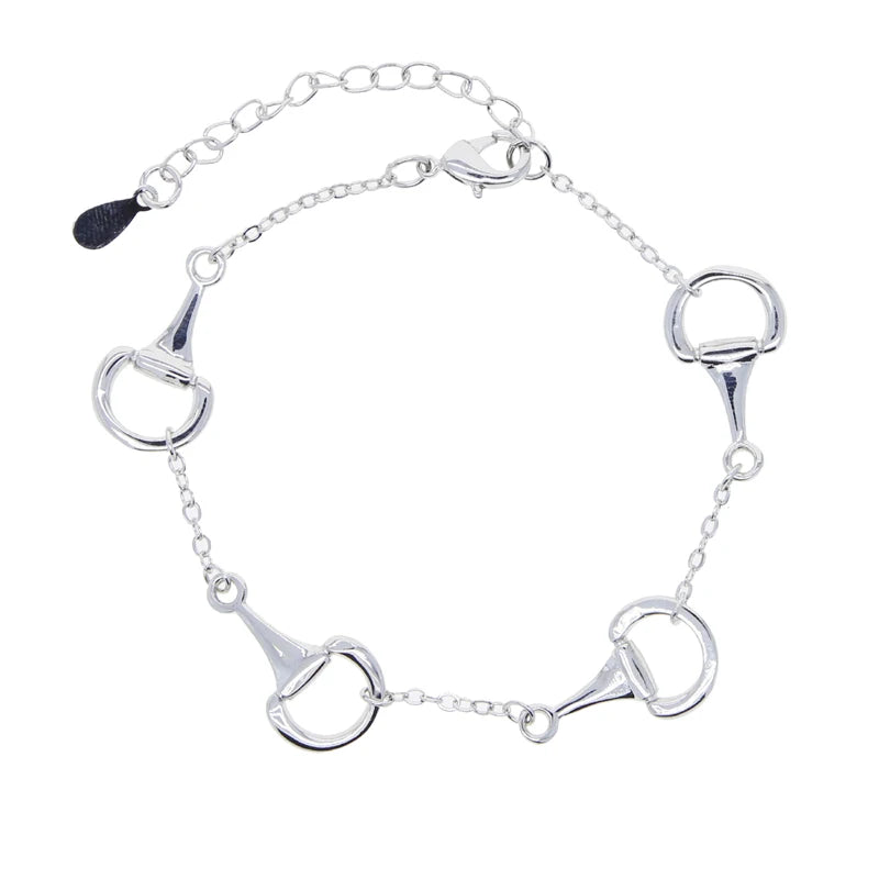 Gold equestrian bit chain bracelet with polished links and adjustable extender